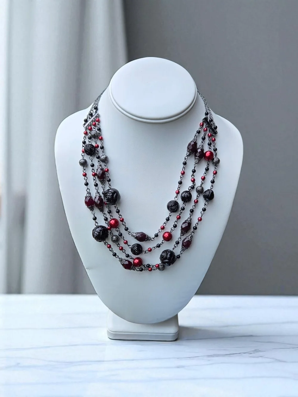 Avon Multi-Strand Black and Red Beaded Necklace